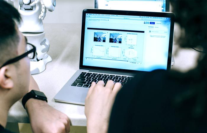 A laptop shows the motion tracking results from a physical therapy session.