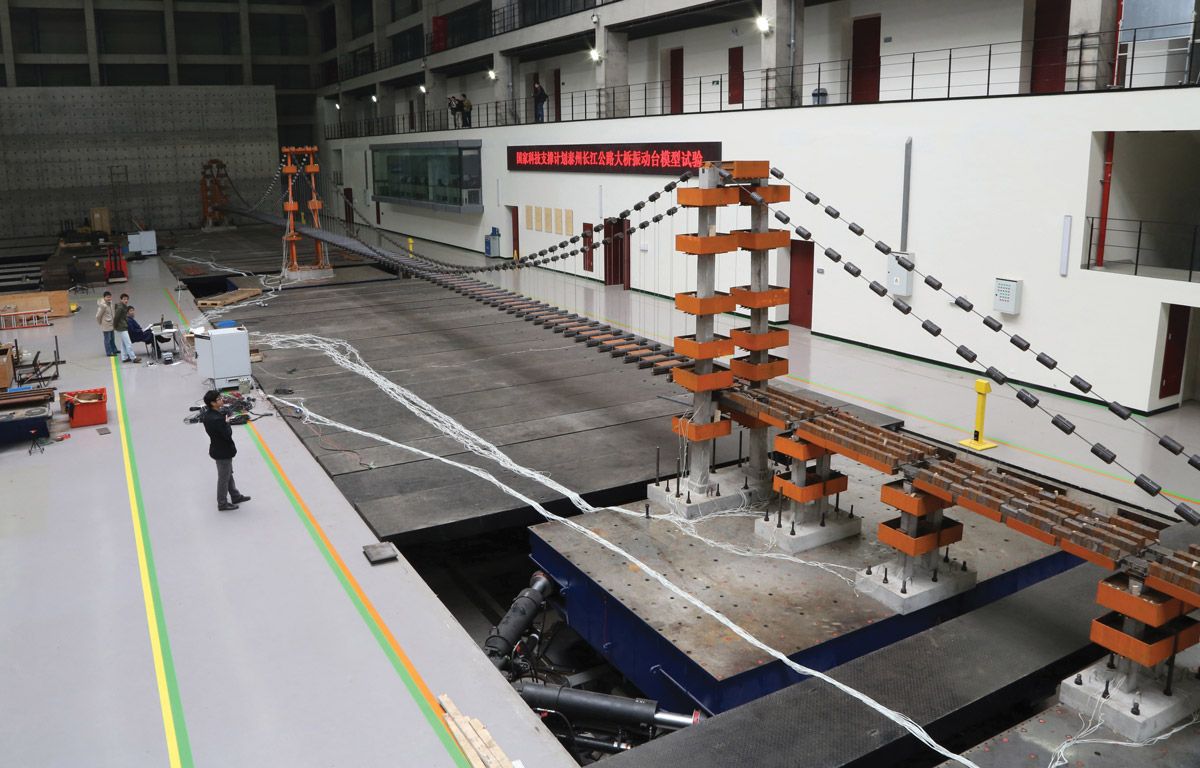 Seismic testing of a scale model of a long suspension bridge. The shake tables are positioned under each of the bridges’ vertical support structures.