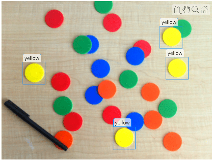 Image of colored ships with blue rectangles labeled "yellow" around all of the yellow chips