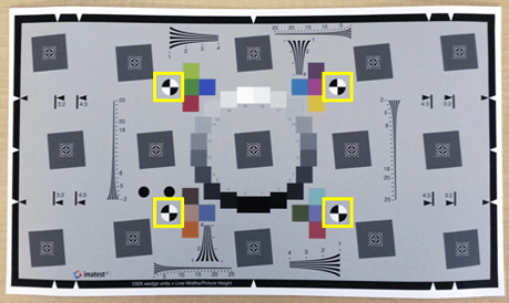 Extended eSFR test chart with four checkered registration markers. Yellow squares are overlaid on the image and encompass the markers.